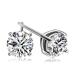 Detailed close-up of classic 925 silver stud earrings with four-prong round zircon setting