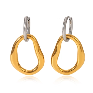 Close-up of gold and silver two-tone irregular organic geometric hoop earrings