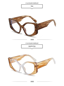 Detail view of tortoiseshell cat-eye sunglasses frames in tea and white tea colors