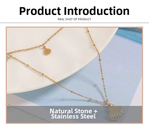 Detail of double-layer stainless steel necklace with fan pendant and green natural stone