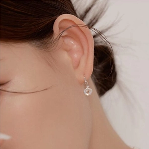 Elegant 925 sterling silver heart earrings with colorful crystals on model wearing