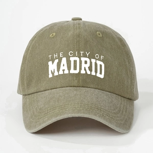 Vintage washed cotton baseball cap in army green featuring The City of Madrid embroidery