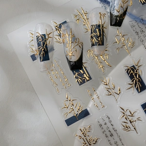 Chinese style 3D gold bamboo nail stickers with calligraphy patterns on long coffin nails