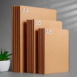 Three sizes of kraft paper notebooks A4 B5 and A5 with stitched binding in minimalist style