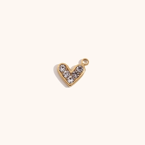 Detail of 14K gold plated heart charm with sparkling cubic zirconia stones for DIY jewelry