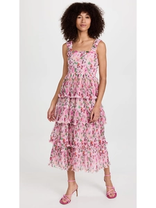 Detail of floral tiered midi dress featuring ruffled bodice and layered ruffle hemline