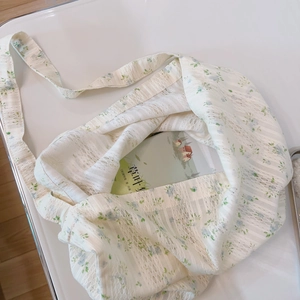 Floral lace cotton shoulder bag with blue-green floral print in a minimalist style