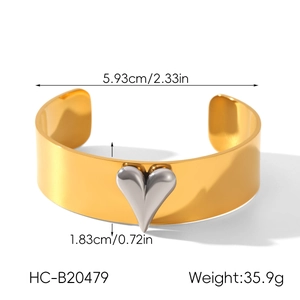 Detailed technical diagram showing dimensions of the gold and silver two-tone heart cuff