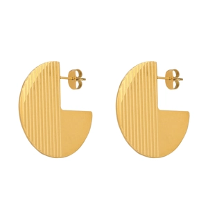 Detailed view of golden semi-circular earrings with vertical striped metal texture