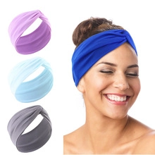 Knot detail on African print headbands in blue, purple, and grey soft stretch fabric