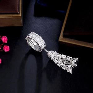 Detail shot of shimmering silver fringe ring with micro-pave rectangular zircons