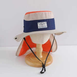 Close-up of kids sun hat featuring breathable mesh panels and protective neck flap