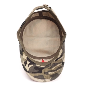 Detail of 100% cotton tactical camo cap interior with adjustable metal buckle strap