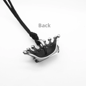 Macro back view of a retro crown pendant with detailed stainless steel construction