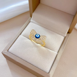Gold butterfly evil eye ring with blue zircon inlay and adjustable band for women