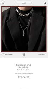 Close-up of hip-hop flame choker and lightning pendant necklace set on model