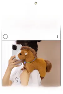 Close-up of a plush horse toy with brown mane, white face, and colorful braided neck cord