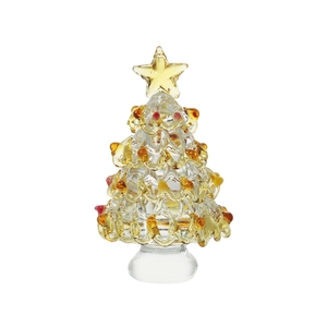 Detailed view of a handcrafted glass Christmas tree with amber accents and top star