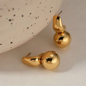 Minimalist gold stainless steel round ball stud earrings with polished curved metal surface