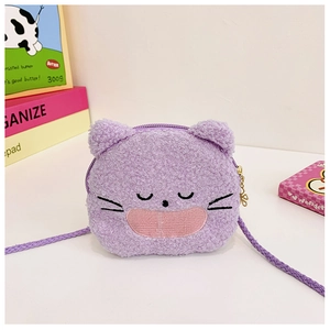 Close-up of cute purple plush cat crossbody bag with soft texture and embroidered face