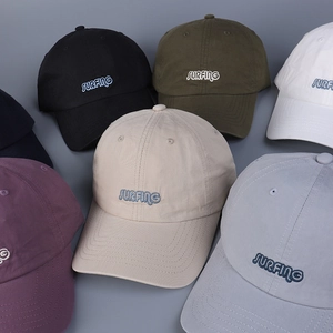 Detail of multi-color cotton baseball caps featuring high-quality SURFING 3D embroidery