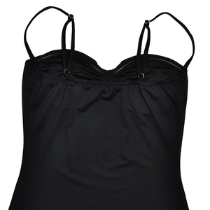 Detail of black camisole dress with spaghetti straps and pleated bust texture