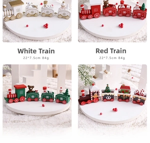 Detailed set of four colored wooden Christmas trains featuring Santa and snowman figures