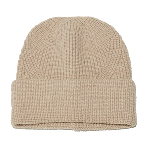 Detailed close-up of ribbed texture and cuffed hem on warm oatmeal knitted beanie