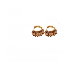 Detailed view of gold earrings with size specs and champagne zircon inlays