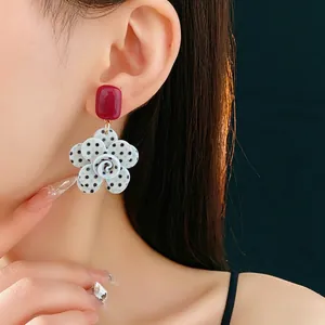 Chic acrylic flower drop earrings with red studs and blue white polka dots pattern