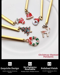 Detailed view of six gold 304 stainless steel coffee spoons with Christmas enamel charms