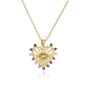 Macro shot of 18K gold heart pendant featuring a colorful zircon evil eye with stones