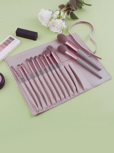 Detailed set of 12 professional makeup brushes with a dust-proof leather roll case