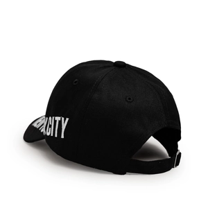 Close-up of white NEW YORK CITY embroidery on side of black cotton baseball cap
