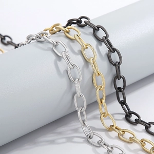 Detailed close-up of titanium steel twist rope chains in silver, gold, and dark grey tones