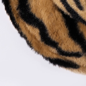 Winter faux fur bucket hat featuring a wild zebra and tiger stripe pattern in soft plush