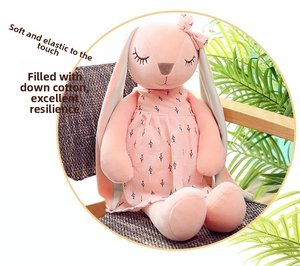 Close-up of pink long-eared bunny toy with soft down cotton filling and bow detail