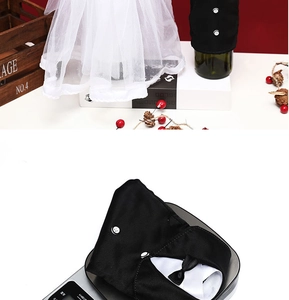 Detailed view of wedding-themed wine bottle covers showing lightweight fabric and net yarn
