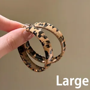 Retro brown leopard print resin hoop earrings with large circular minimalist design