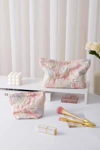 Floral jacquard travel toiletry bag set with textured fabric and elegant fabric label