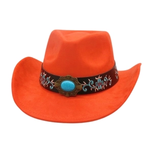 Detail of orange cowboy hat featuring a turquoise gemstone and vintage embroidery details