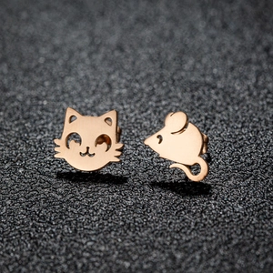 Chic rose gold asymmetric stud earrings featuring minimalist cat and mouse cartoon designs