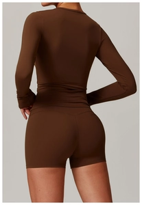 Back view of brown brushed long-sleeve yoga top and matching high-waist shorts set