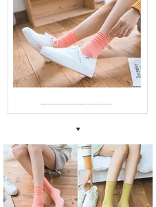 Detail showing pink and yellow nylon velvet crew socks with breathable mesh texture