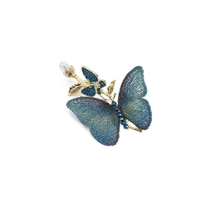 Elegant gold butterfly brooch with blue gradient mesh wings and a white freshwater pearl