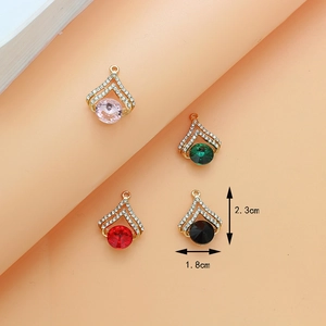 Detail of star-shaped alloy pendants in four colors with V-frame rhinestone setting