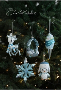 Blue and silver Christmas ornaments set featuring snowflake and penguin on green tree