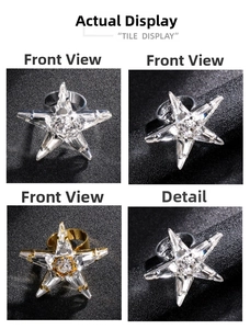 Detailed macro view of crystal star rings with silver and gold metallic frames