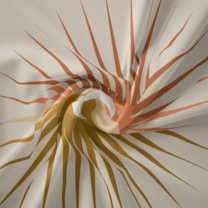 Detail of warm-toned sunburst pattern on soft cream bohemian wall tapestry fabric