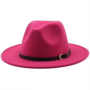 Detail of rose red wool fedora hat featuring a black leather band with golden metal buckle